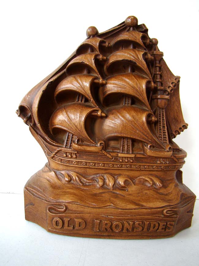 A pair of faux wood "OLD IRONSIDES" bookends circa 1940-1950.